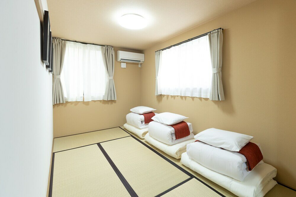 Фото Nagahori Hairu Dotonbori Condo