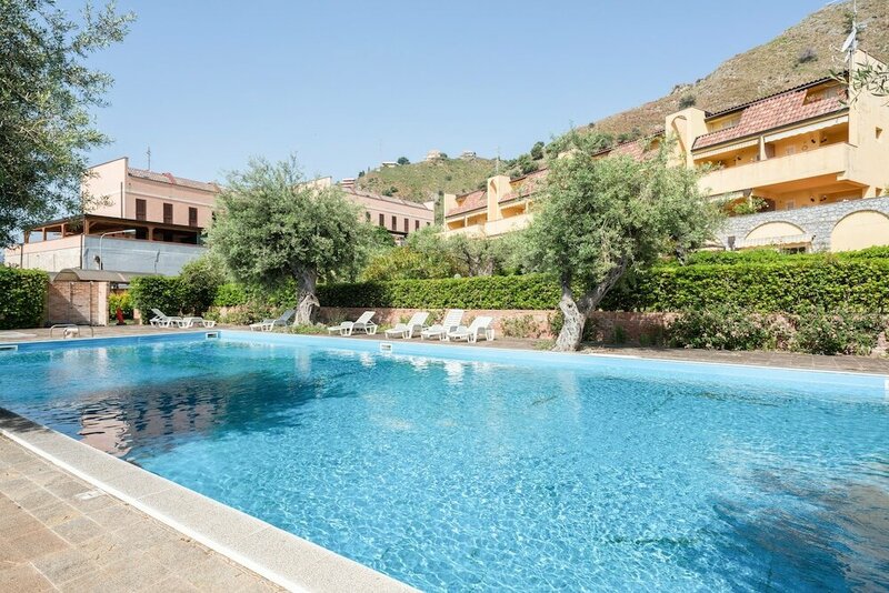 Апартаменты Tolosa Apartment - Piscina E Parcheggio Inclusi!