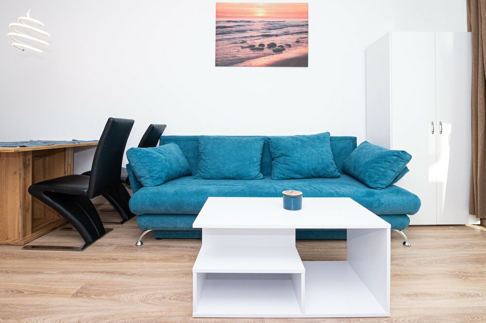 Фото WaterFront City Apartments by UrbanRent