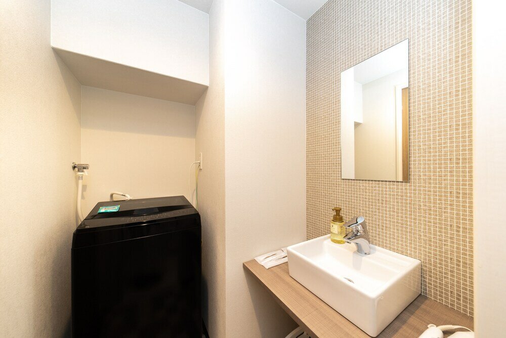 Фото Wellstay Osaka Shinimamiya