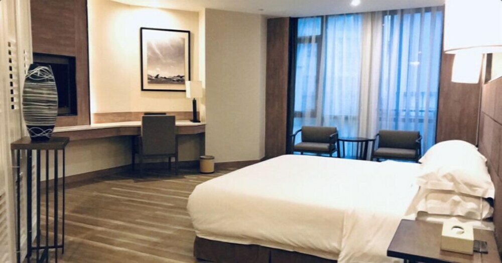 Фото Auden International Hotel