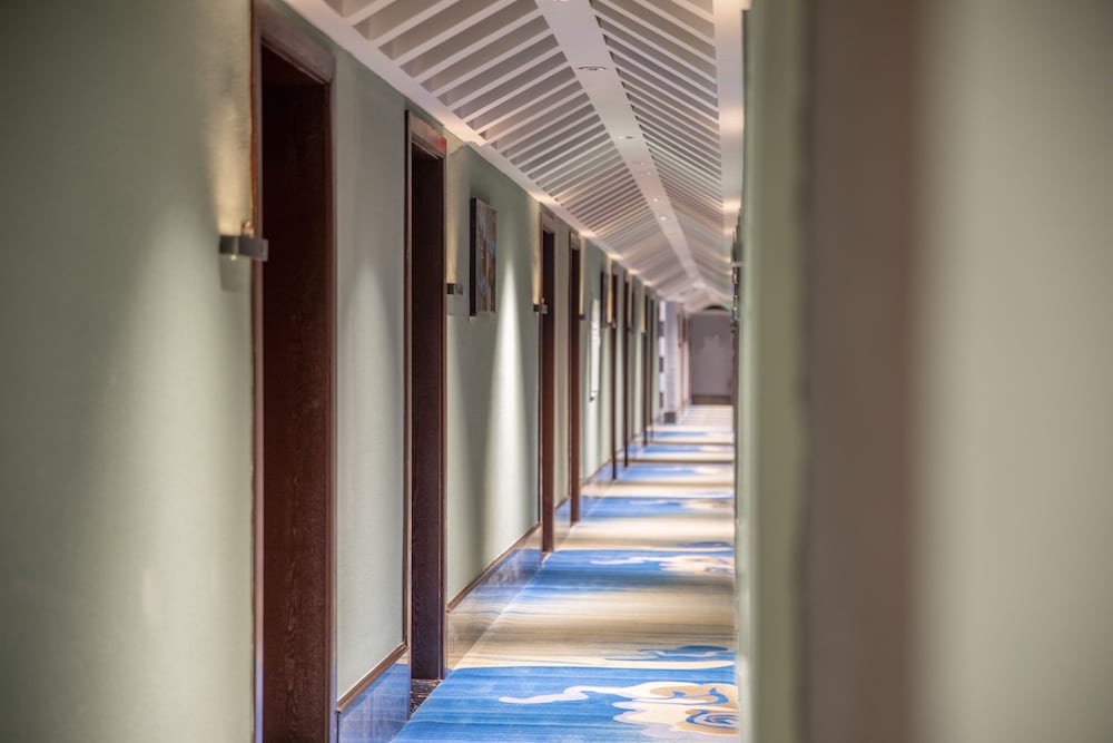 Фото Yiwu Manting City Hotel