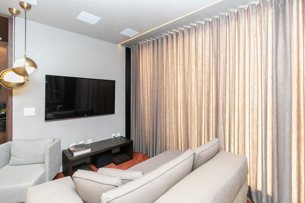 Фото Loft alto padrão com varanda