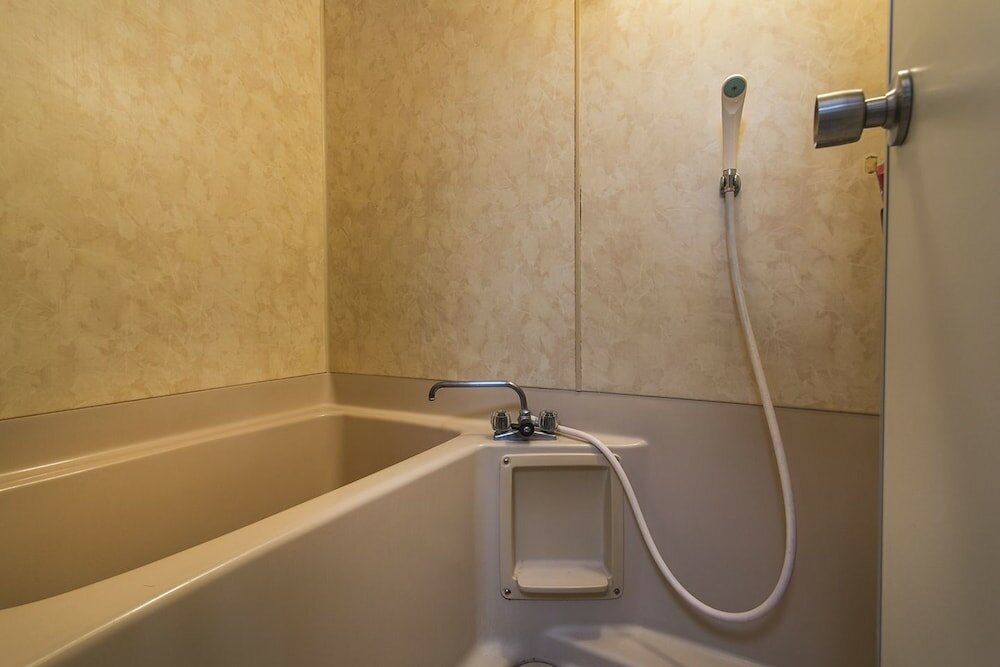 Фото Shinsaibashi Su Casa Apartment