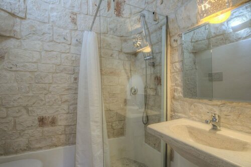 Апартаменты Trullo Palmento Cisternino by Typney