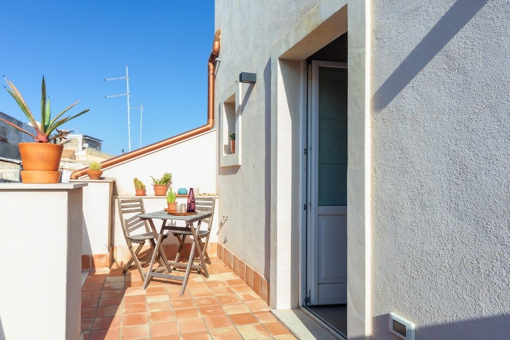 Фото Mercato di Ortigia Apartments