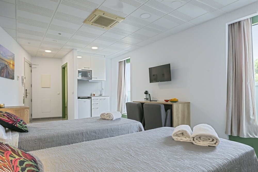 Фото Les Begues Apartments