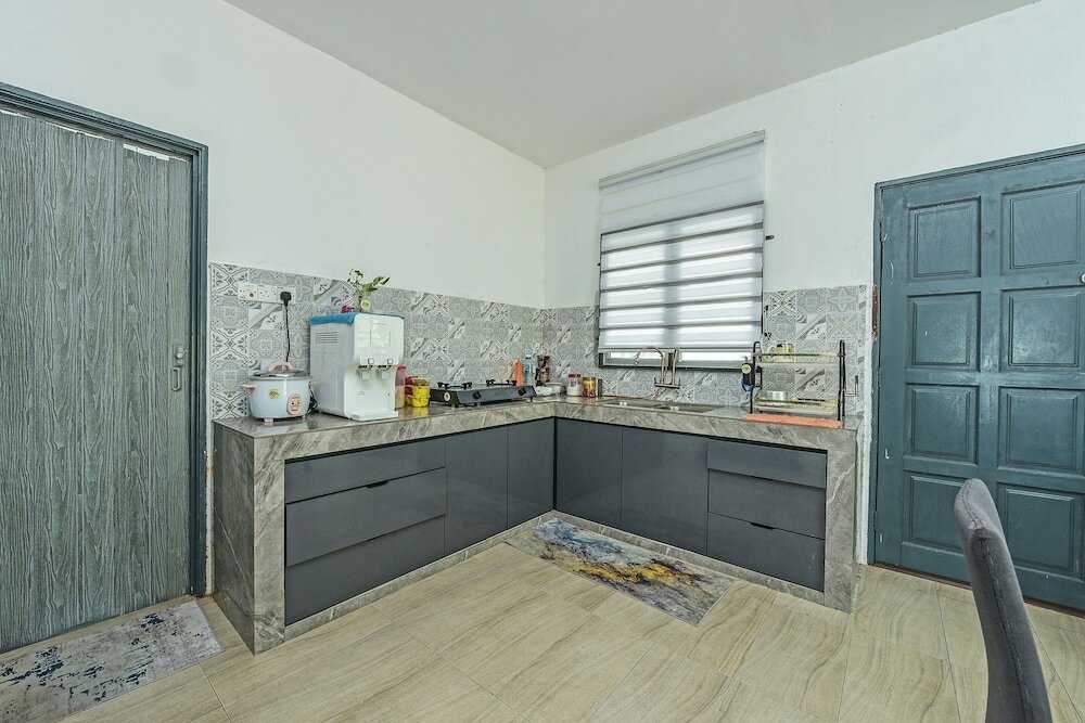 Фото Oyo Home 90682 Liliz Mambang Farmstay