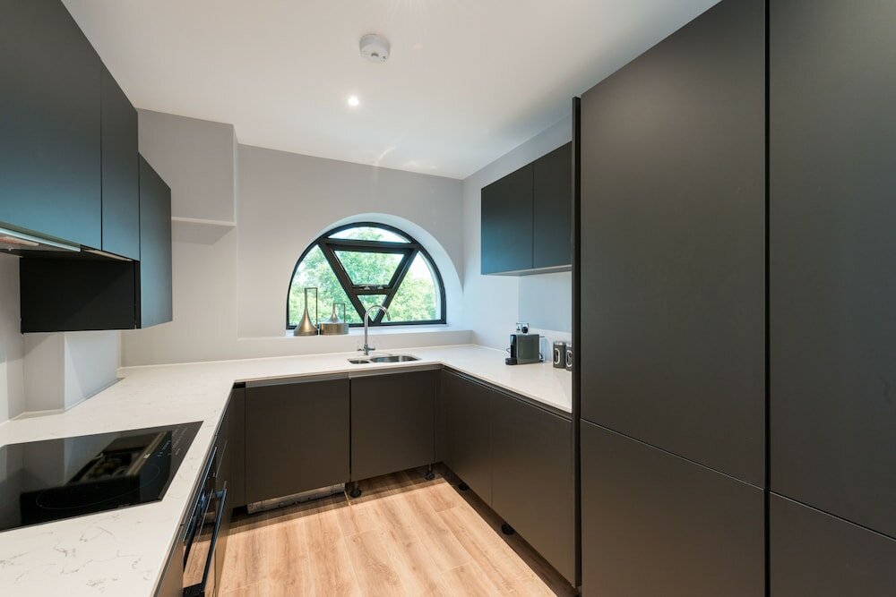 Фото The Carlyle - Elegant Serviced Apartments