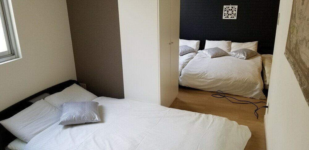 Фото Guesthouse Daikokucho Ekimae