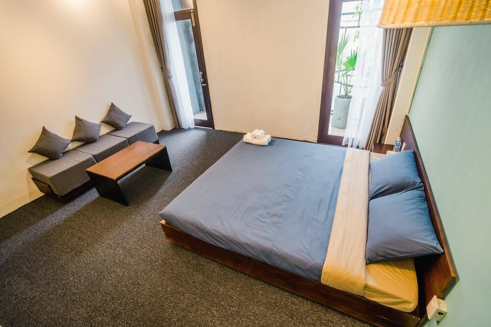 Фото The Garden Hotel and Apartment