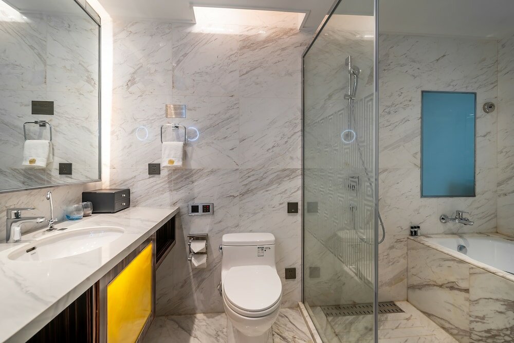 Фото Suning Universal Hotel All-Suites