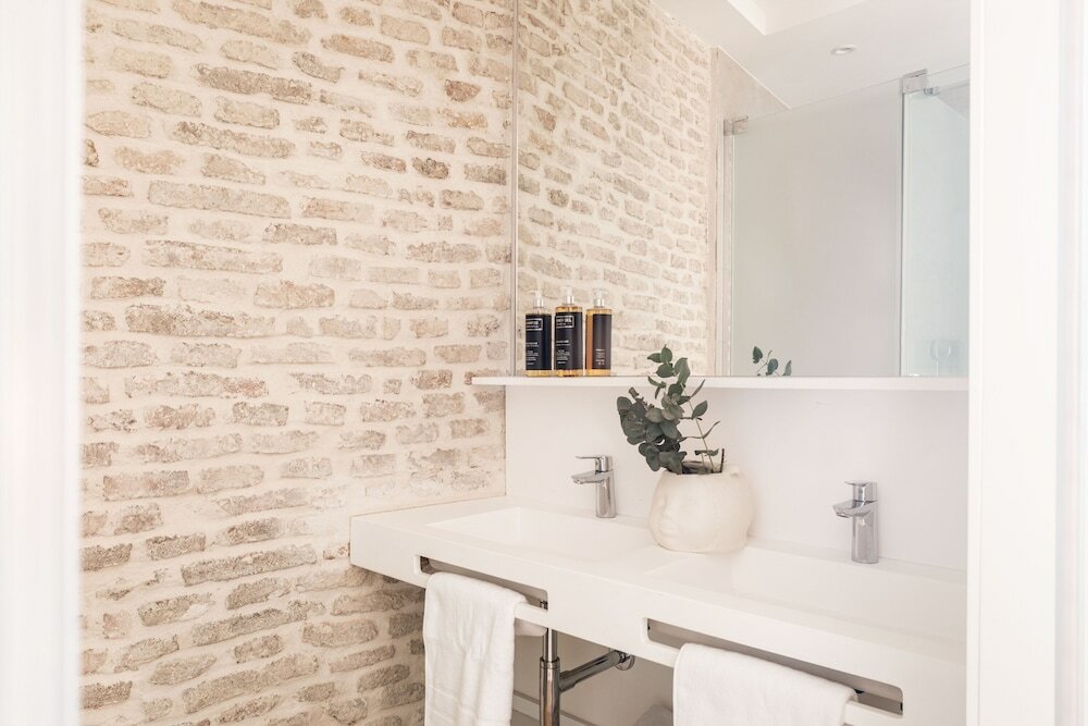 Фото Mylu Suites by Puerta Catedral