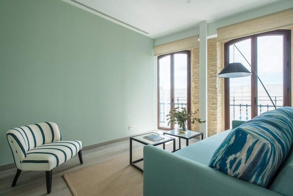 Фото Sercotel Sevilla Guadalquivir Suites