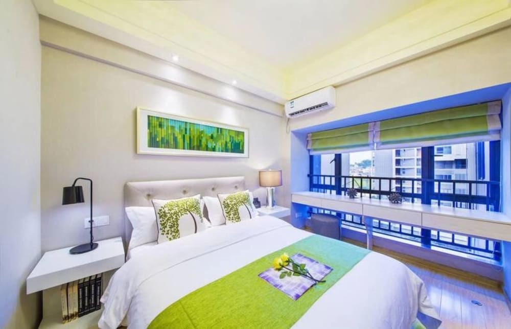 Фото BaiHe International Apartment Hotel