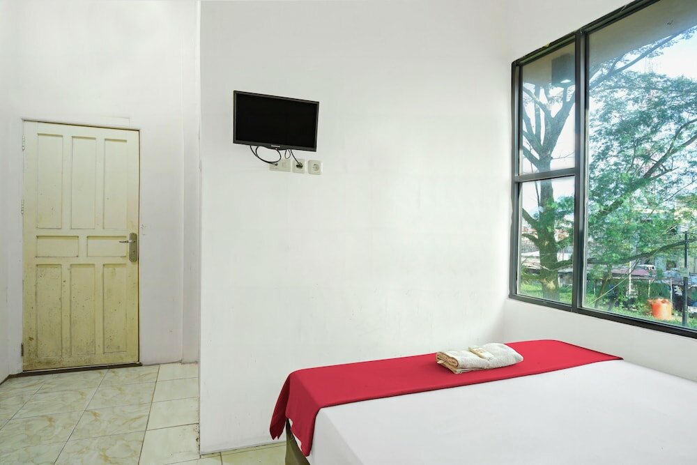 Фото Oyo 92609 Guest House Malay Singkawang