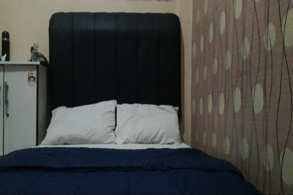 Фото Oyo 90706 Kost Alam Jaya Syariah