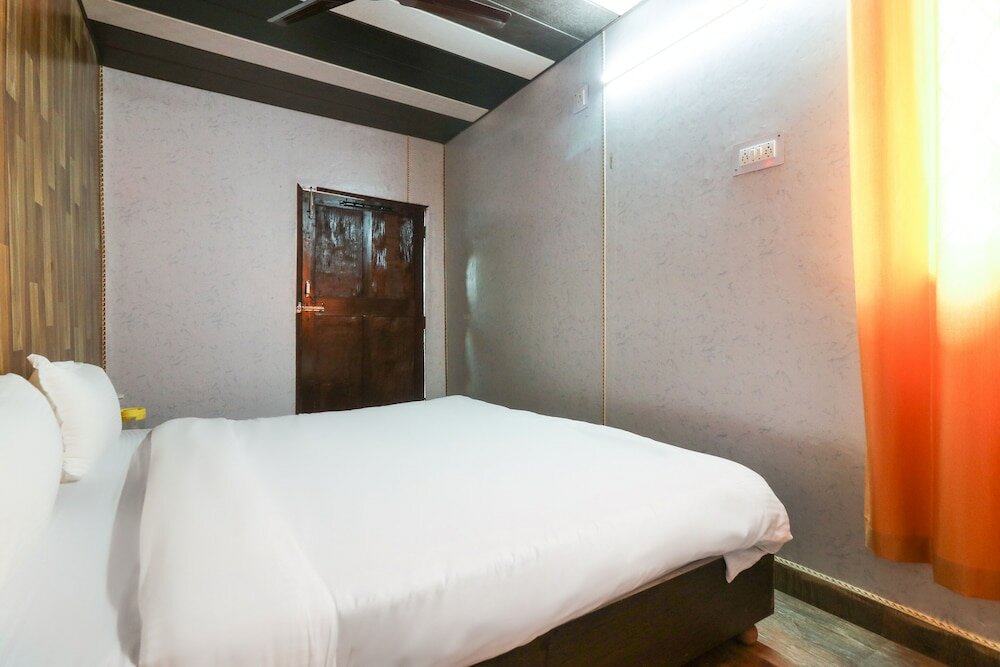 Фото Spot On 49126 Silent Valley Appartments