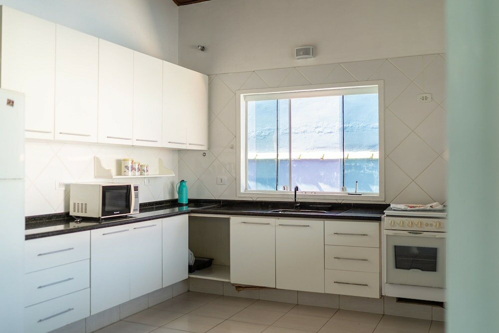 Фото Aconchegante casa em condomínio fechado com lazer completo