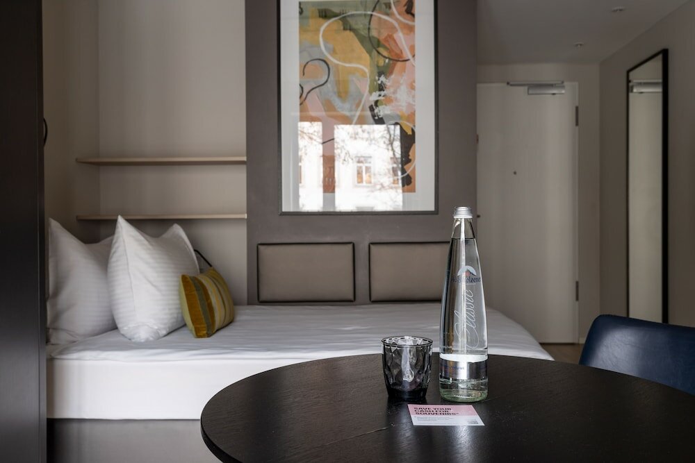 Фото Numa i Stark Rooms & Apartments