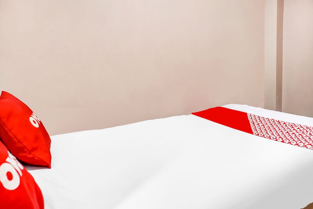 Фото Spot On 91336 Guesthouse Tarumanegara