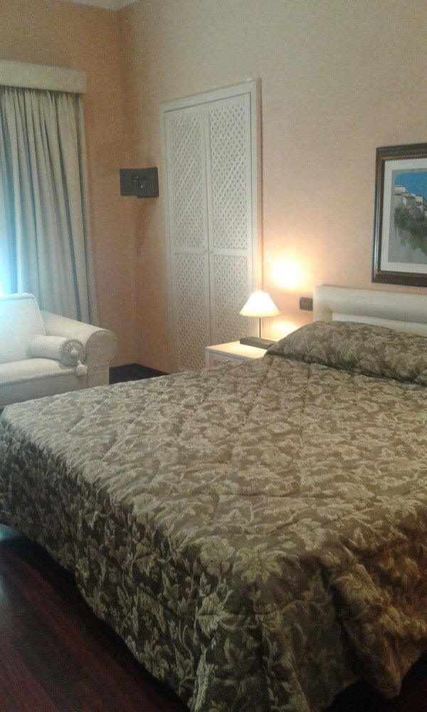 Фото Colosseo Studio Suites