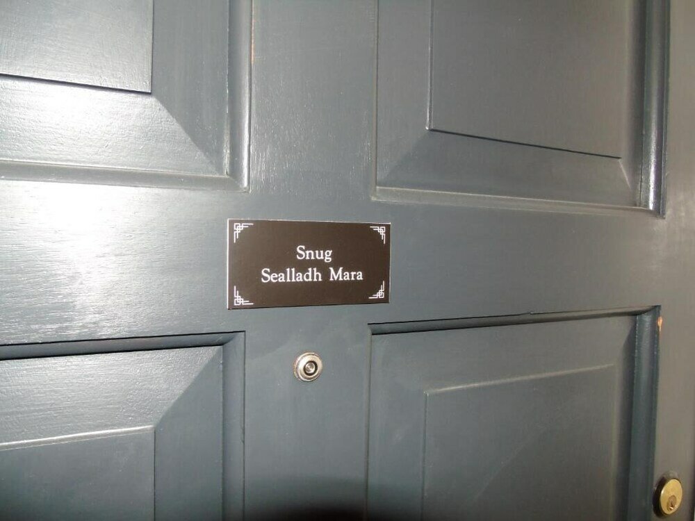 Фото Snug - Sealladh Mara Apartment