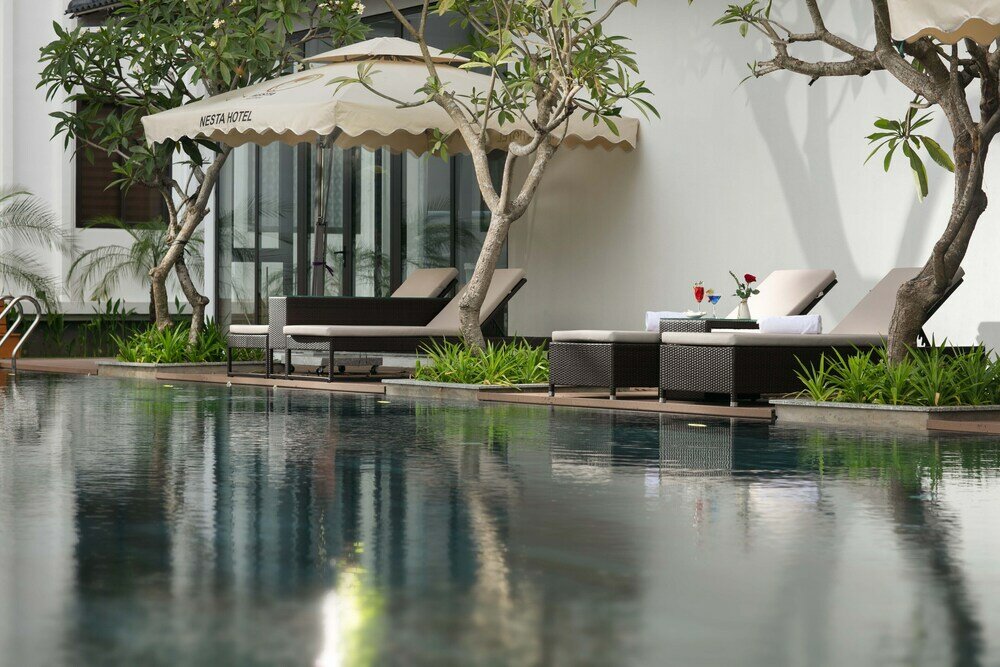 Фото Nesta Hotel Da Nang