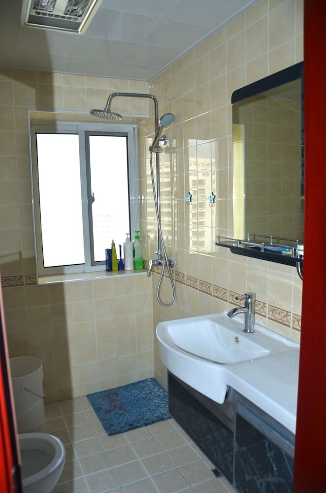 Фото Lanzhou Longshang Mingzhu Apartment Two-bedroom suite