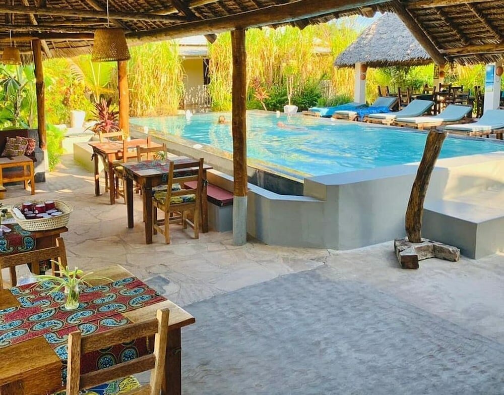 Фото Shamba Village Hotel