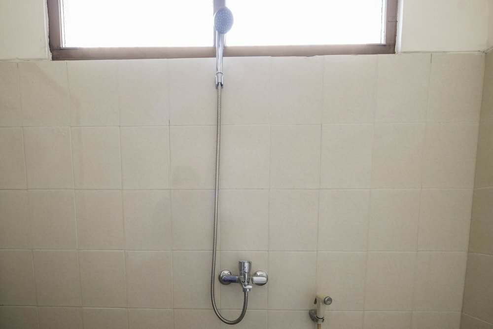 Фото Super Oyo 2346 Hotel Padjadjaran 1