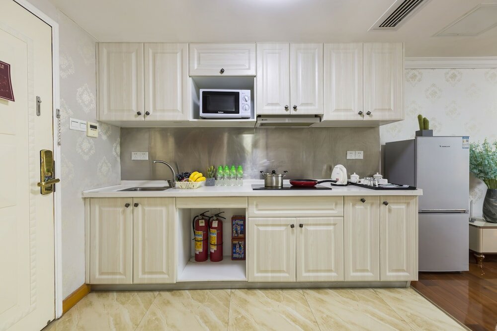 Фото Yoyo International Apartment