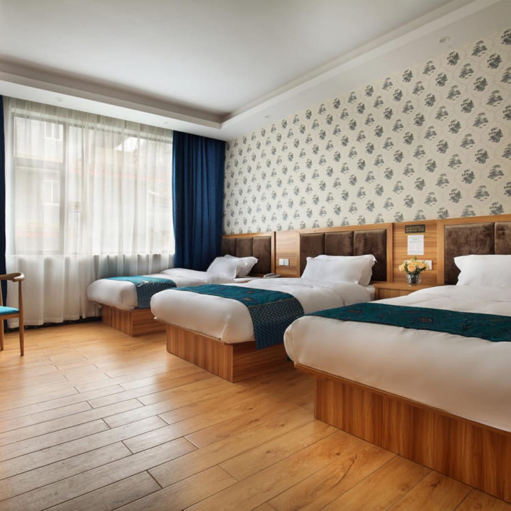 Фото Yangshuo Qingyunge Hotel