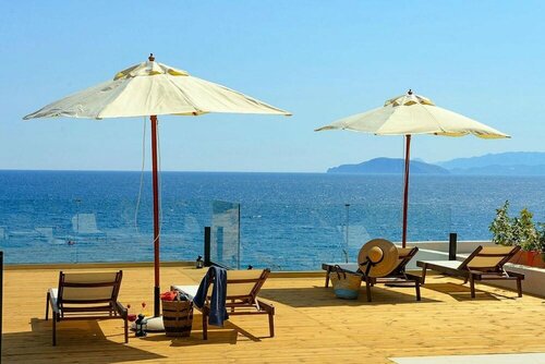 Гостиница Beachfront 2 Bedroom Villa With Jacuzzi в Аммударе