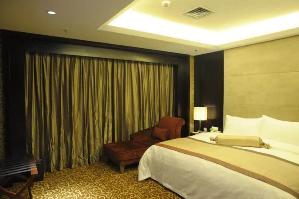 Фото Junyi Wangchao Hotel