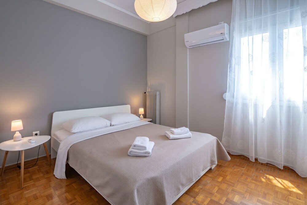 Фото Artemis Deluxe Athens City Center Apartment