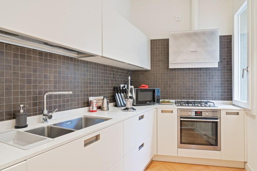 Фото San Fermo Luxury Apartment