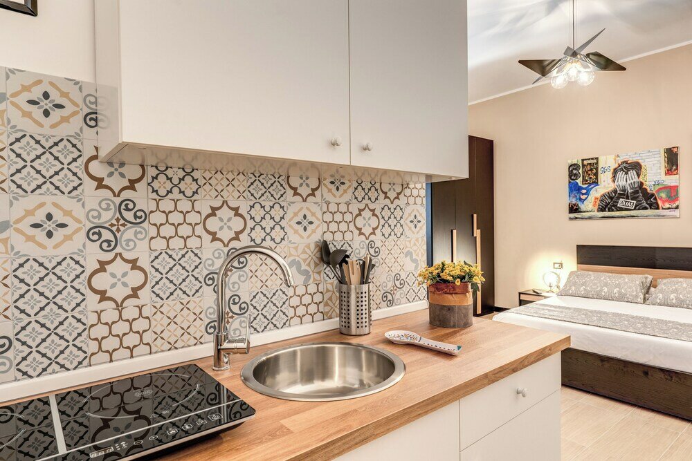 Фото The Quarters Naples Apartment