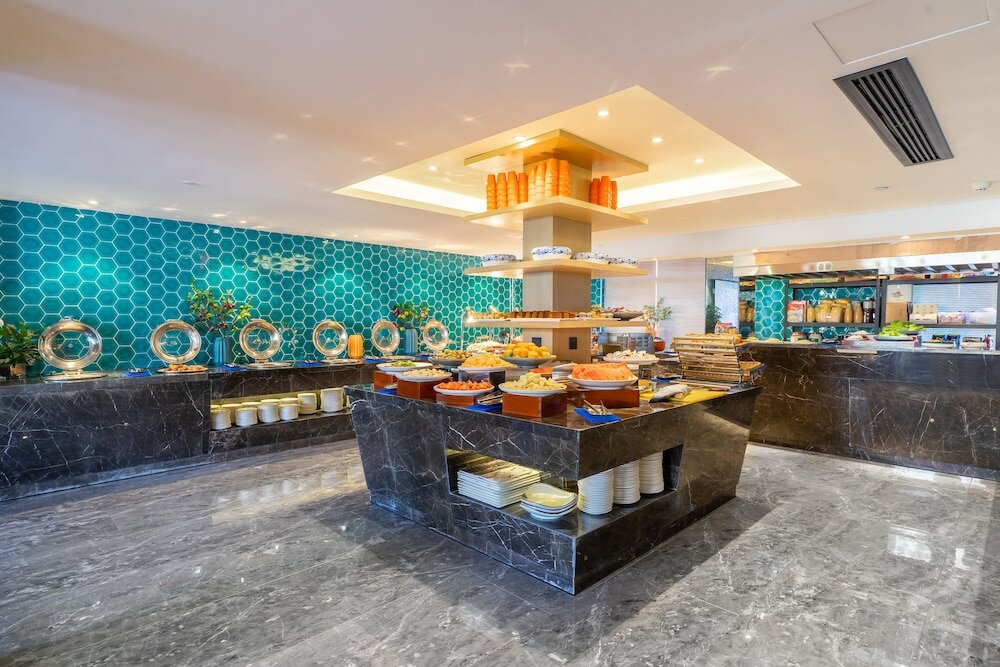 Фото Yì Wū Shì Bó Yì Měi Jū Hotel