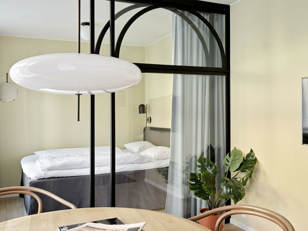 Фото Apēron Apartment Hotel