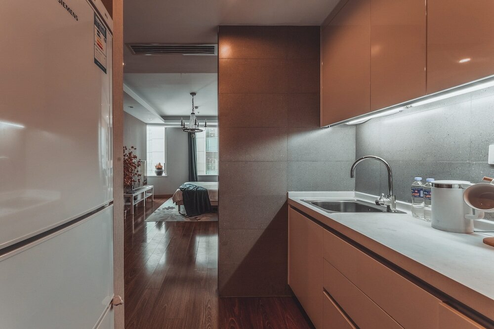 Фото Tianjin G'apartment