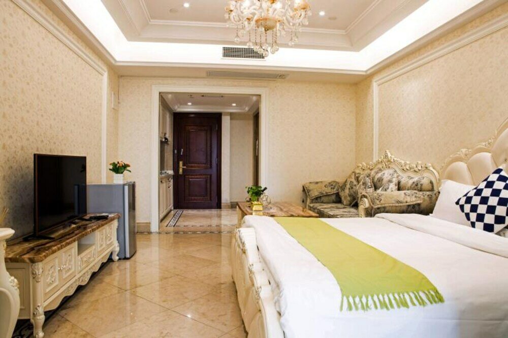 Фото Ruide Apartment Wanyi Plaza Branch