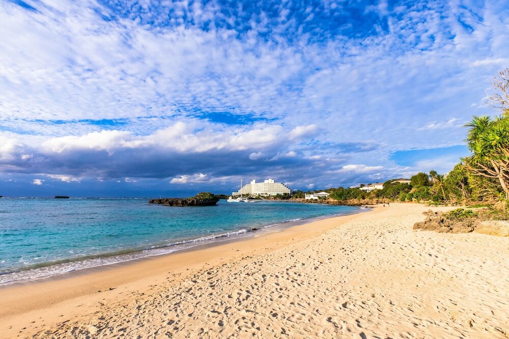 Фото Mr. Kinjo in front of Manza Beach