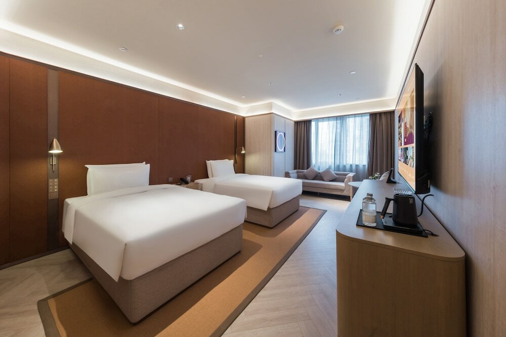 Фото Orange Crystal Shenzhen Xinhaofang Hotel