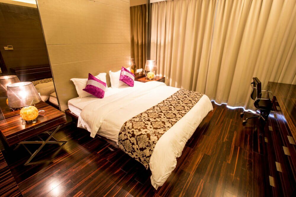 Фото Wanlong Apartment Pazhou Branch