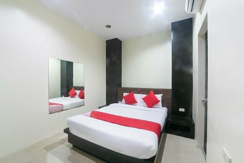 Гостиница Oyo 183 Jrjf Hotel в Тагуме
