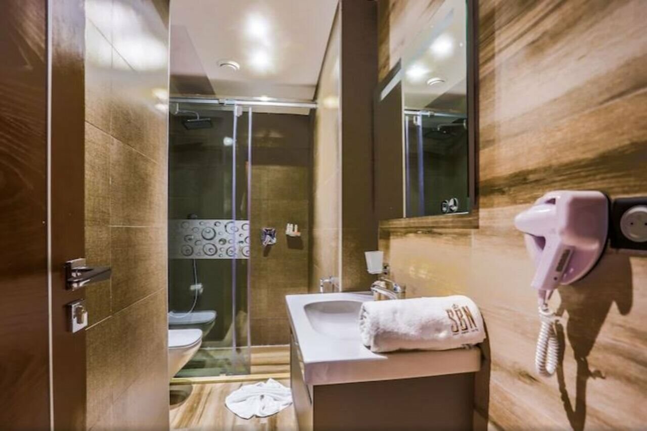 Фото Sbn Suites Hotel