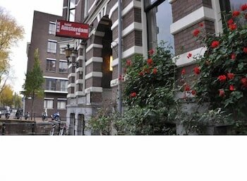 Фото Amsterdam Inn Hotel