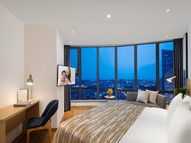 Фото Joysuites Nantong