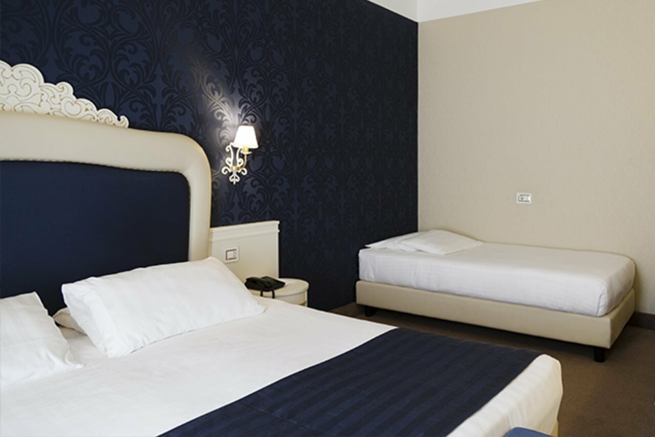 Фото Ih Hotels Roma dei Borgia